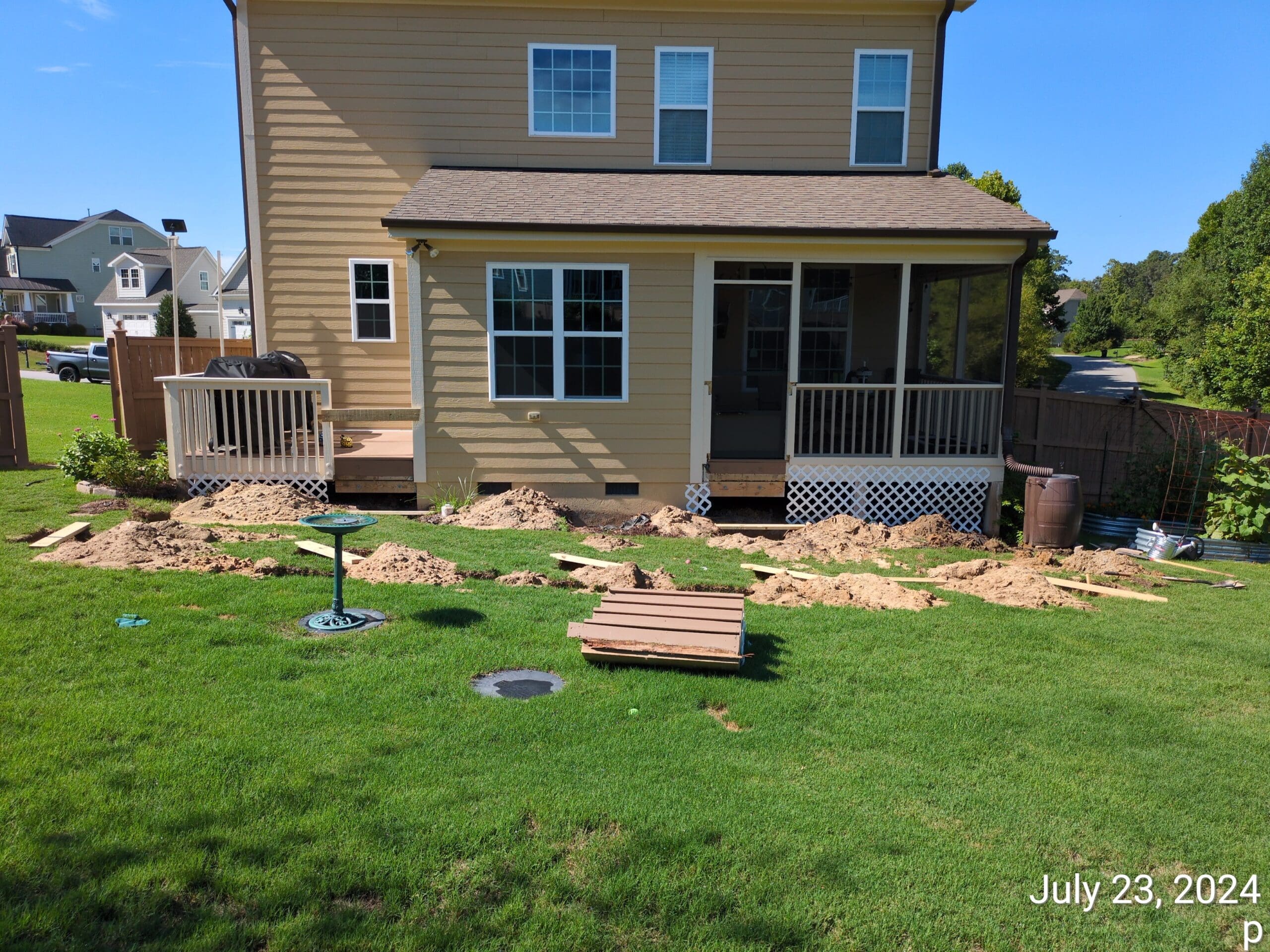 Ground prep for a new deck in Cary, NC by Carolina Contractos